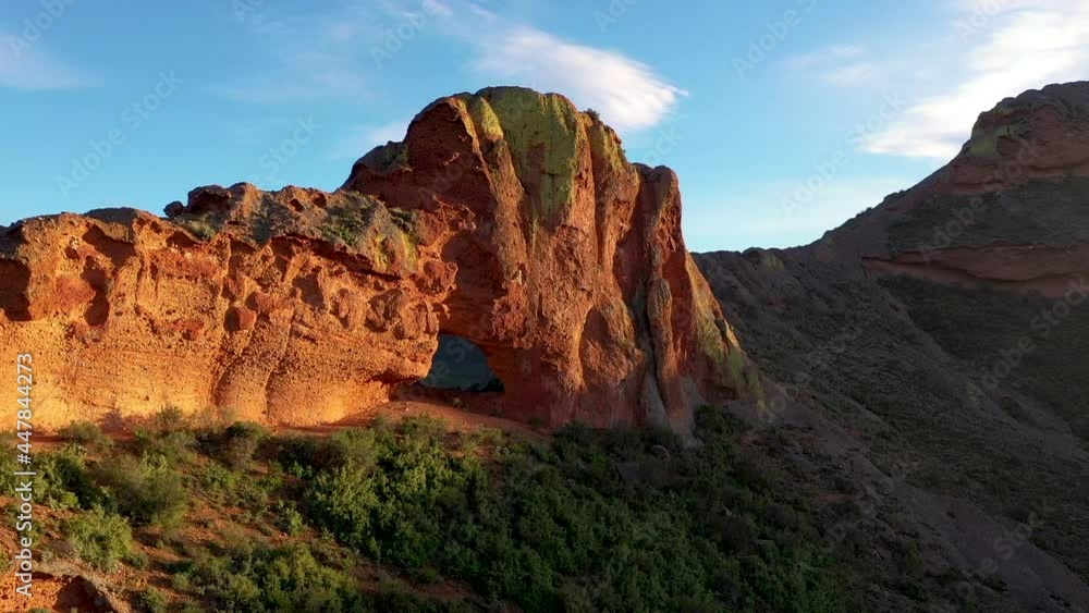 Hole in mountain Track right to left Drone shot in slow motion Hole in mountain Track right to left Drone shot in slow motion