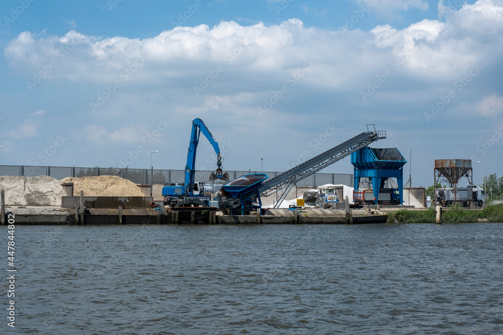 The bulk cargo loaded in port - sand for construction