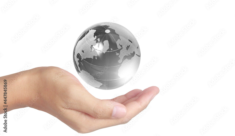 Glass globe in hand,Energy saving concept, image furnished by NASA Glass globe in hand,Energy saving concept, image furnished by NASA