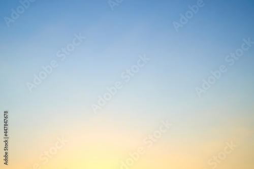 Ukrainian peaceful sky, blurred sunset summer sky ss blue and yellow gradient, pastel colors, background for summer concepts and design © AlexLit