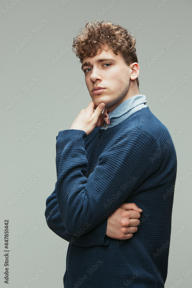 Caucasian man's portrait in retro style, fashion of 70s, 80s years isolated on gray studio background with copyspace for ad. Caucasian man's portrait in retro style, fashion of 70s, 80s years isolated on gray studio background with copyspace for ad.