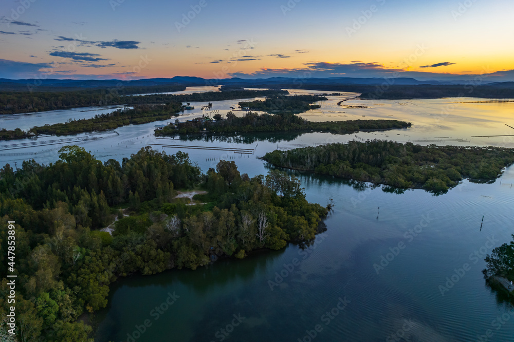 Fototapeta premium Sunset over the bay and rivers