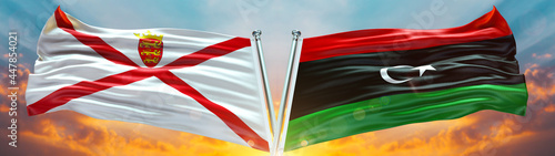 aaaaa Flag and Libya flag waving with texture sky Cloud and sunset Double flag   photo