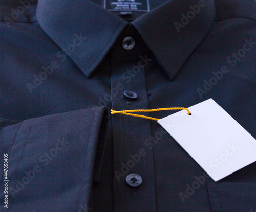 Close up of dark Men's shirt.