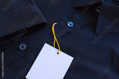 Close up of dark Men's shirt.