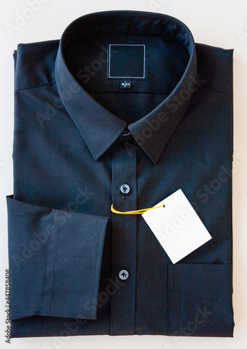 Close up of formal shirt on white