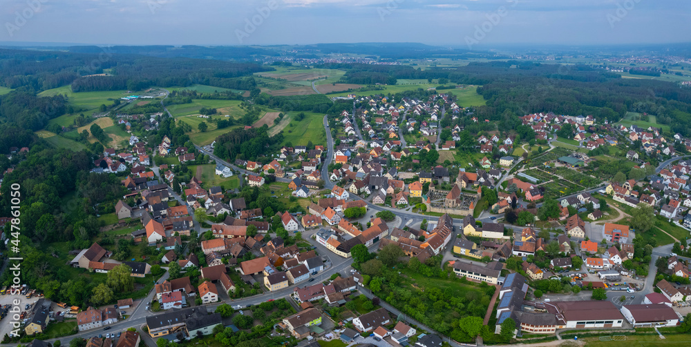 Aerial view of the city Effeltrich in Germany, on a cloudy day in spring.