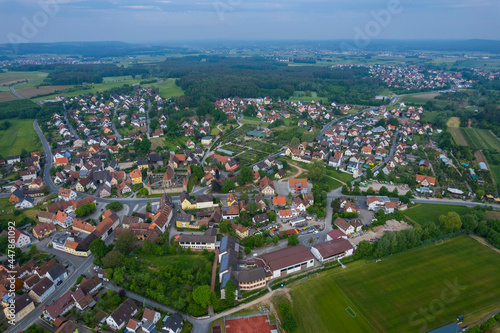 Aerial view of the city Effeltrich in Germany, on a cloudy day in spring.