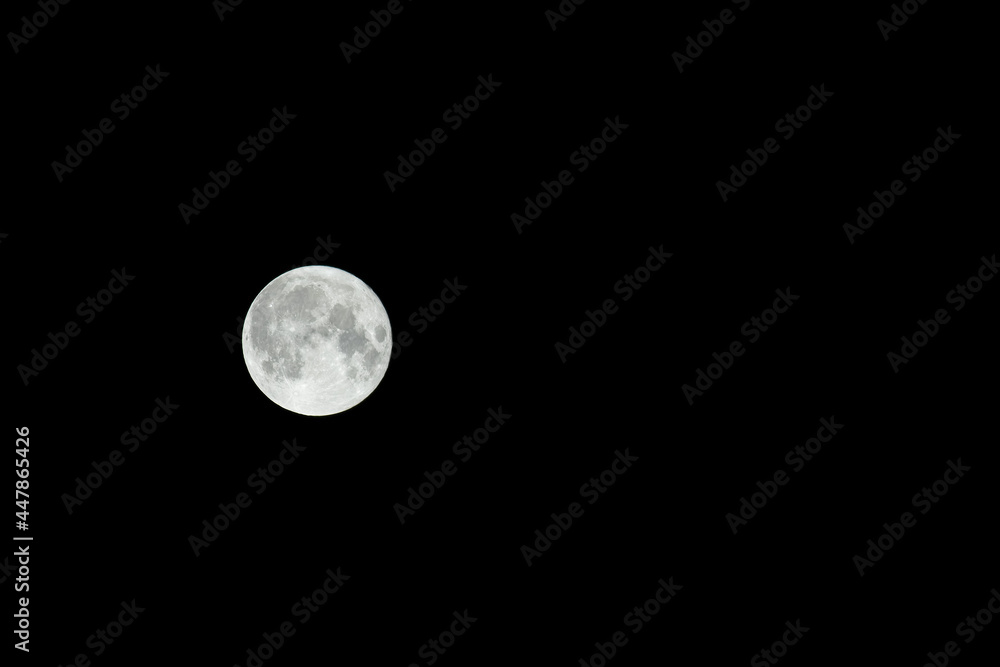 Full moon. Sturgeon moon isolated on natural black night sky. Full moon. Sturgeon moon isolated on natural black night sky.