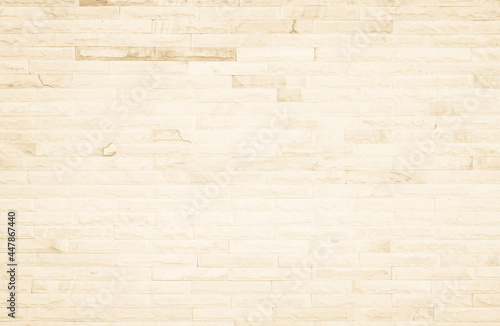 Empty background of wide cream brick wall texture. Beige old brown brick wall concrete or stone textured decor design backdrop.