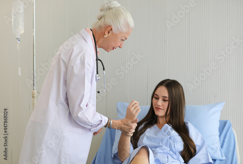 Wallpaper Mural Senior older female doctor visit the patient room and make a history taking for diagnosis and cure process Torontodigital.ca