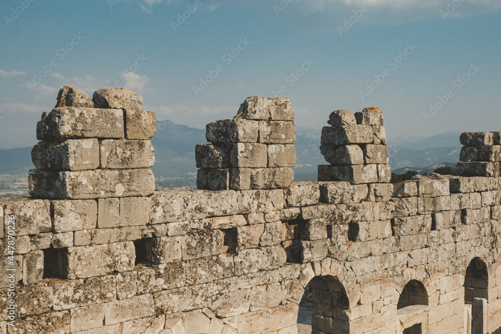 Kibyra Ancient City in Turkey. Walls and stones in the ancient city. Big buildings in the ancient city. Worked stones and columns. City of gladiators. Selective focus.