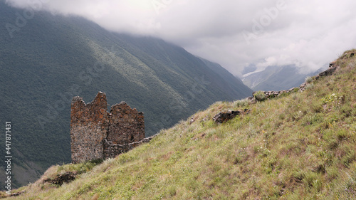 View of ruins of medieval tower in Tmenikau village. North Ossetia, Caucasus, Russia.