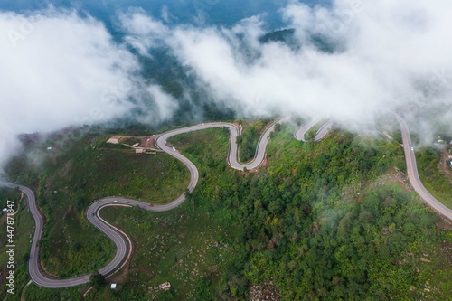 Top view, aerial shot from a drone. and a winding path on a very beautiful steep mountain, Phu Thap Boek, Phetchabun Province, Thailand.