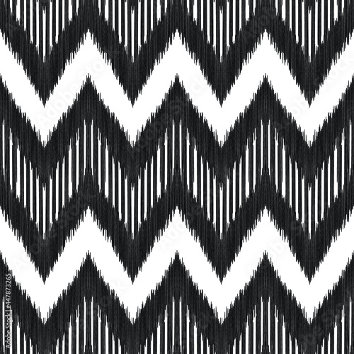 Ikat seamless pattern for home decor ideas, textile, wallpaper, card or wrapping paper. Ethnic, boho fashion style. Tribal vector background. Black and white graphic design.