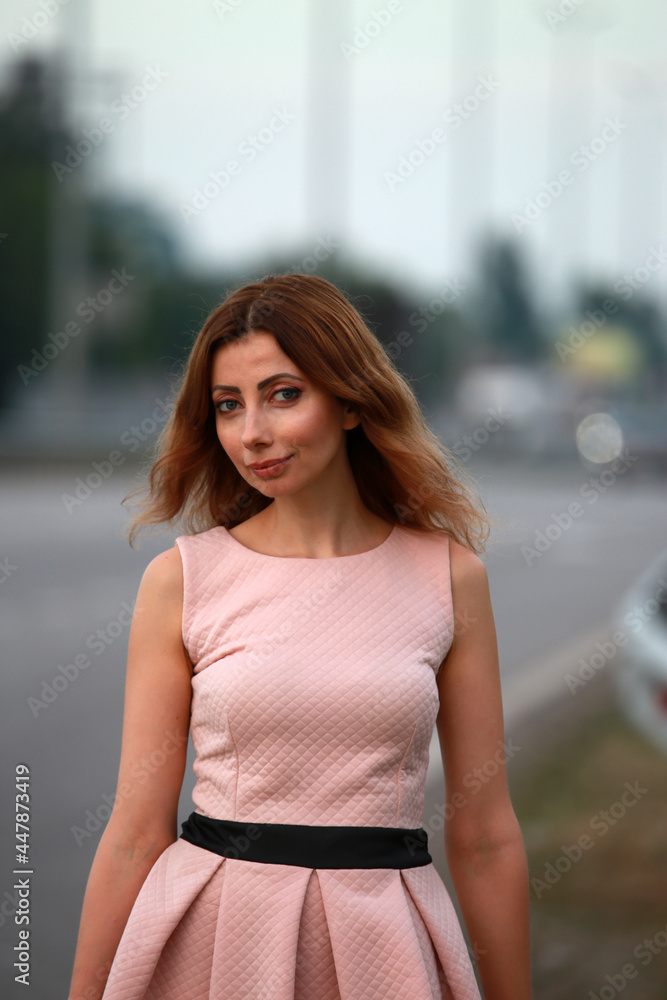 Portrait of beautiful woman in the street