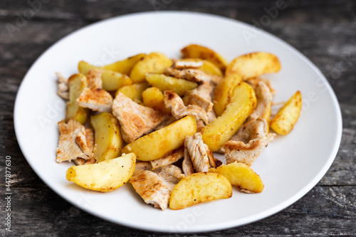 Pan-fried chicken and potatoes