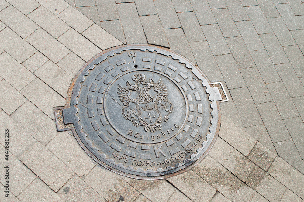 Kaliningrad, Russia - July 7, 2021: Kaliningrad, Russia - July 7, 2021: sewer manhole of the city of Konigsberg