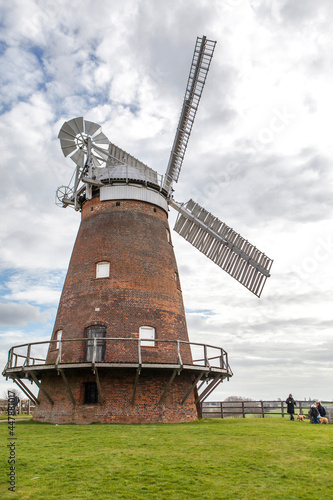 Dunmow, Essex, UK , . A traditional old English windmill near the Essex village of Thaxted set against a blue summer sky. photo