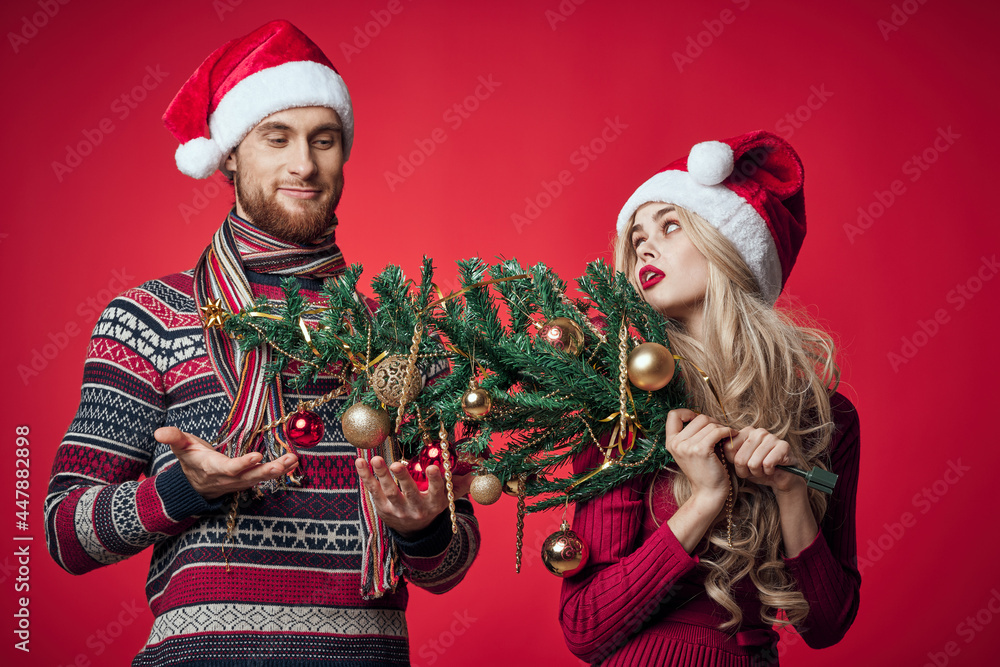 man and woman in holiday christmas fun decoration toys man and woman in holiday christmas fun decoration toys