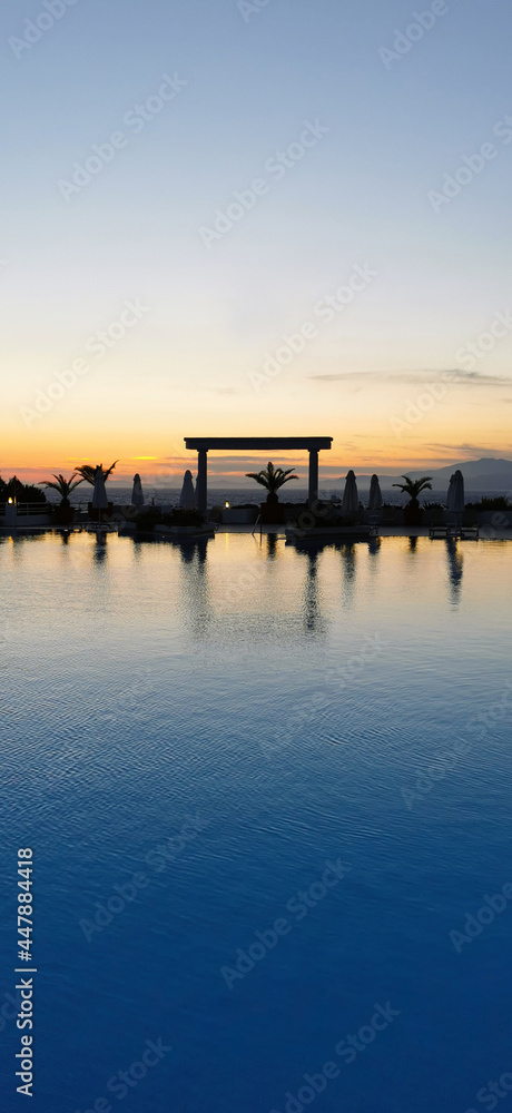 Beautiful sunset over the empty pool and the sea. The Aegean sea. Turkey, Kusadasi.