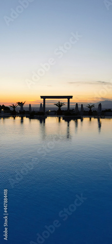 Beautiful sunset over the empty pool and the sea. The Aegean sea. Turkey, Kusadasi. © Irina Anashkevich