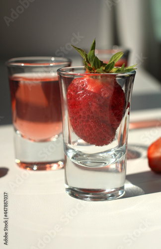 Wallpaper Mural strawberry compote tincture with ice in glass glasses with strawberries and ice cubes Torontodigital.ca