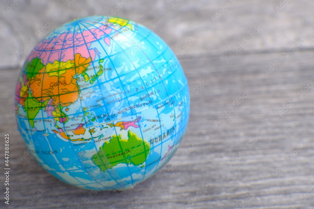 Globe on wood table background and space for text, eco day, save earth day Globe on wood table background and space for text, eco day, save earth day