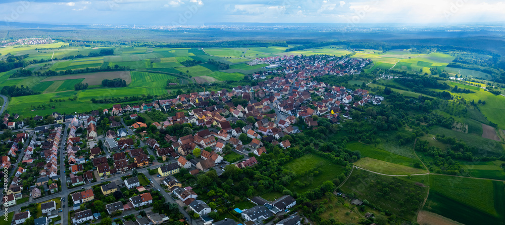 Aerial view of the city Kalchreuth in Germany, on a cloudy day in spring. Aerial view of the city Kalchreuth in Germany, on a cloudy day in spring.