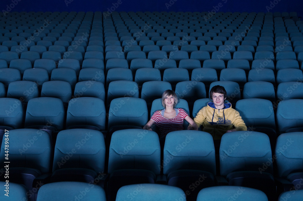 Couple in empty movie theater Couple in empty movie theater