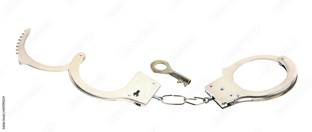 Classic chain handcuffs with key on white background Classic chain handcuffs with key on white background