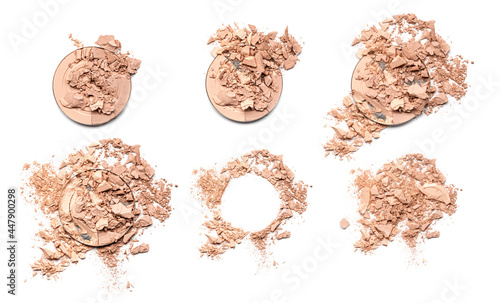 Set of broken light beige makeup powder isolated on white background. photo