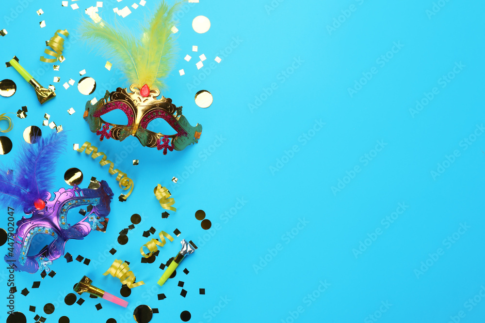Flat lay composition with carnival items on light blue background. Space for text Flat lay composition with carnival items on light blue background. Space for text