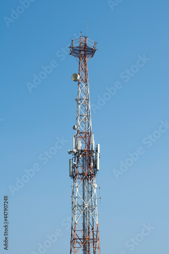 Communications tower with blue Cloud sky background (ID: 447907248)