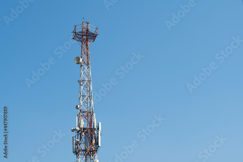 Communications tower with blue Cloud sky background (ID: 447907889)