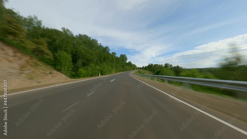Movement by private transport on a wide, empty highway. No traffic. Transport infrastructure. Long-distance movement through the countryside. High quality. 4k footage. Movement by private transport on a wide, empty highway. No traffic. Transport infrastructure. Long-distance movement through the countryside. High quality. 4k footage.