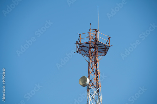 Communications tower with blue Cloud sky background (ID: 447908660)