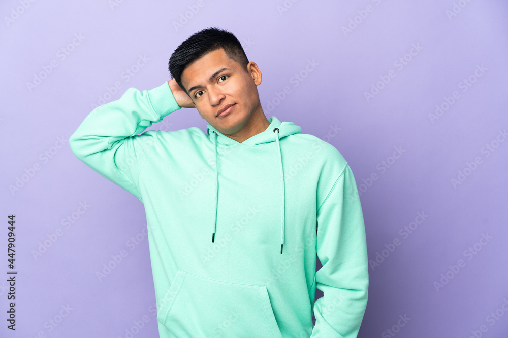 Young Ecuadorian man isolated on purple background having doubts Young Ecuadorian man isolated on purple background having doubts