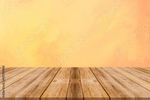 wooden table on yellow background texture © Ratesh