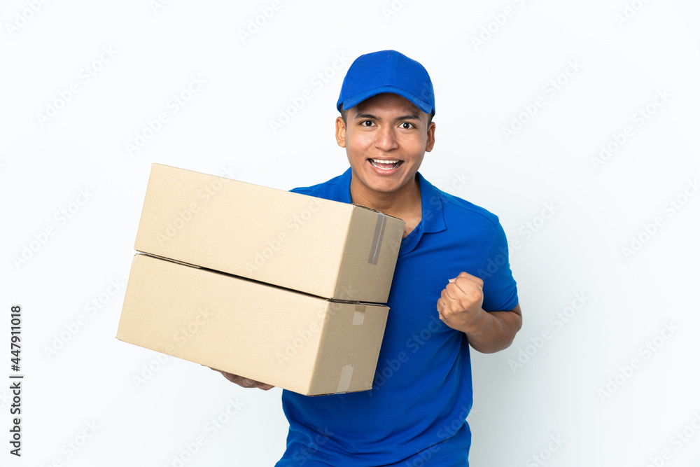 Delivery Ecuadorian man isolated on white background celebrating a victory in winner position Delivery Ecuadorian man isolated on white background celebrating a victory in winner position