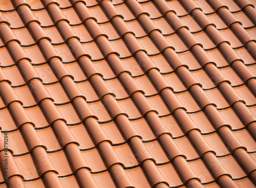 Repetitive pattern of orange roof tile  (ID: 447912640)