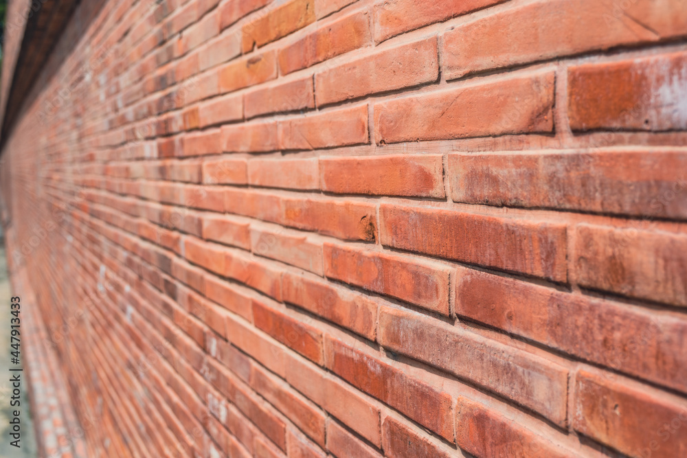 perspective photo of brown brick wall perspective photo of brown brick wall