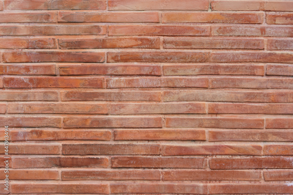 Photo of the front of the brick wall of the temple Photo of the front of the brick wall of the temple