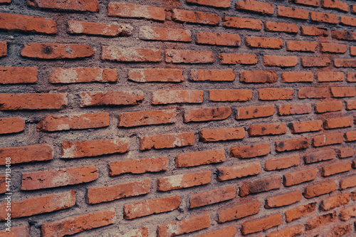 Brick wall background with white stains