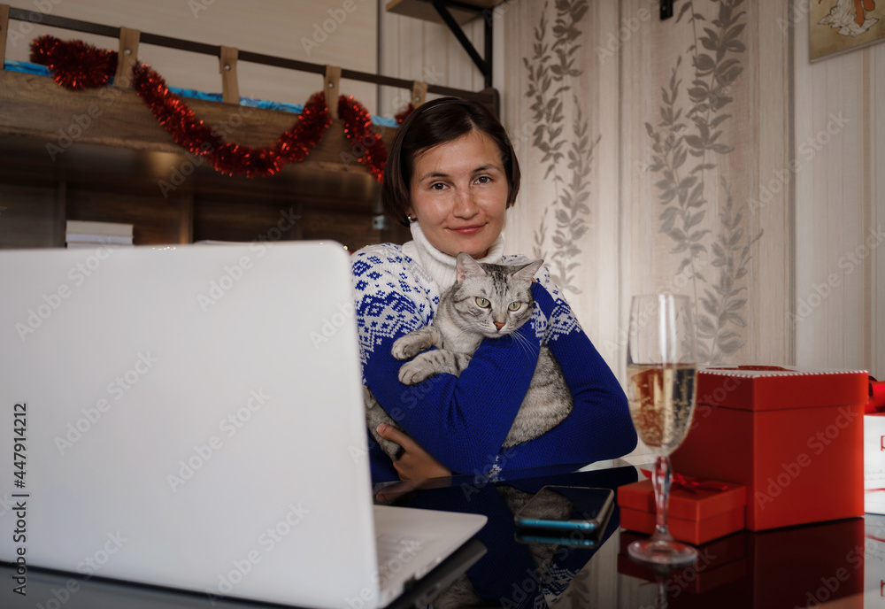 Asian woman quarantine for protection coronavirus and working from home with computer on table.