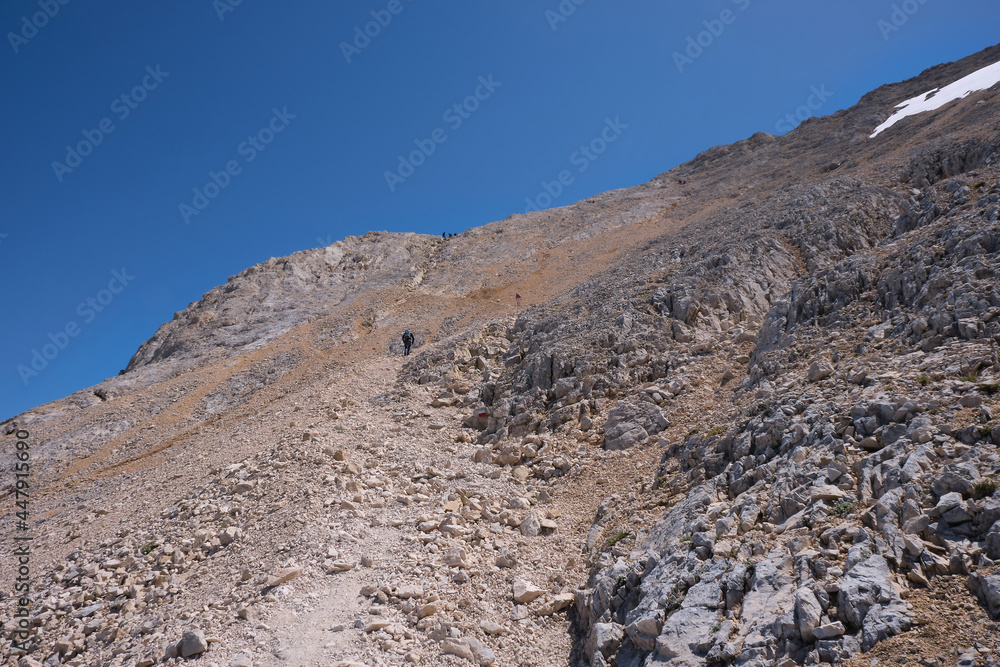 climbers on the normal route that leads to the summit of the gran sasso d'italia abruzzo climbers on the normal route that leads to the summit of the gran sasso d'italia abruzzo
