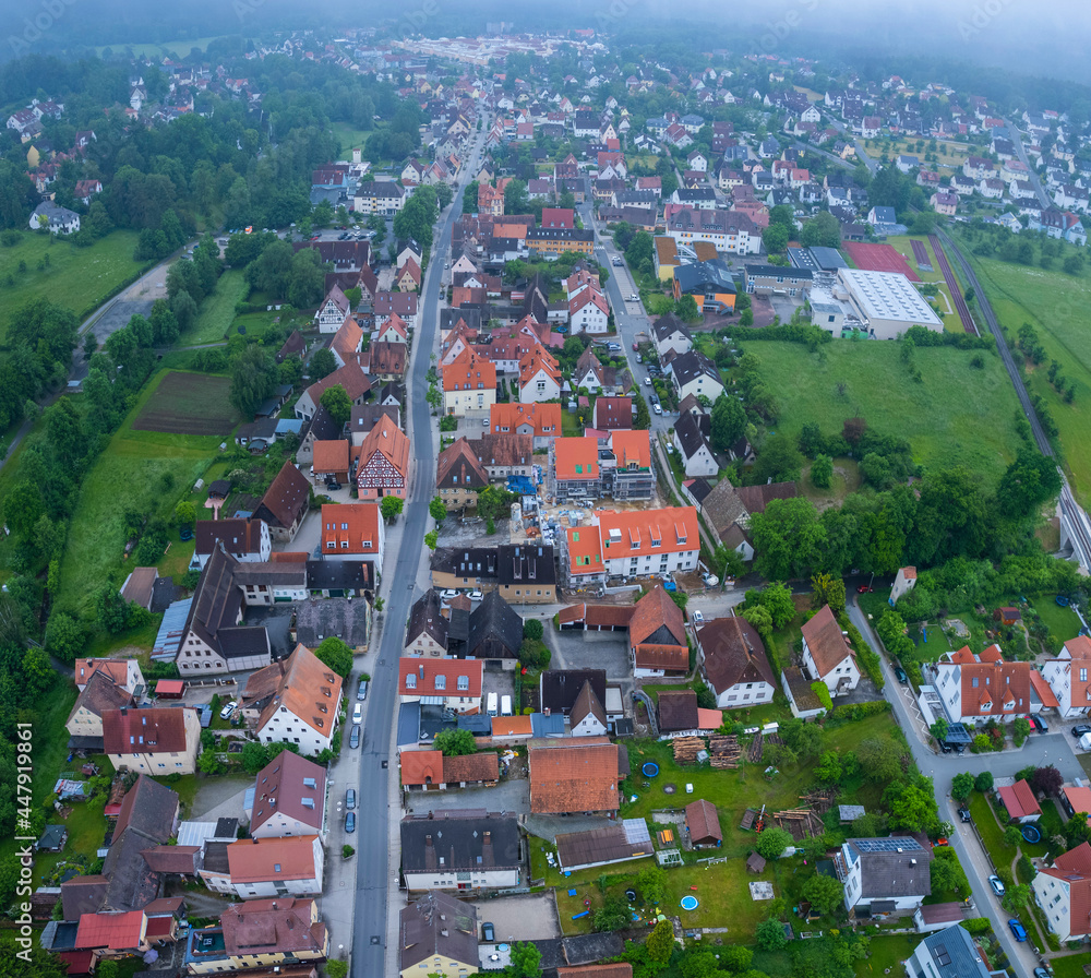 Aerial view of the city Heroldsberg in Germany, Bavaria on a cloudy early morning in spring