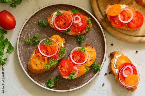 Tasty bruschetta with tomato. Easy cook, nutritious snack. Beautifully decorated catering banquet menu. Food snacks and appetizers for buffet