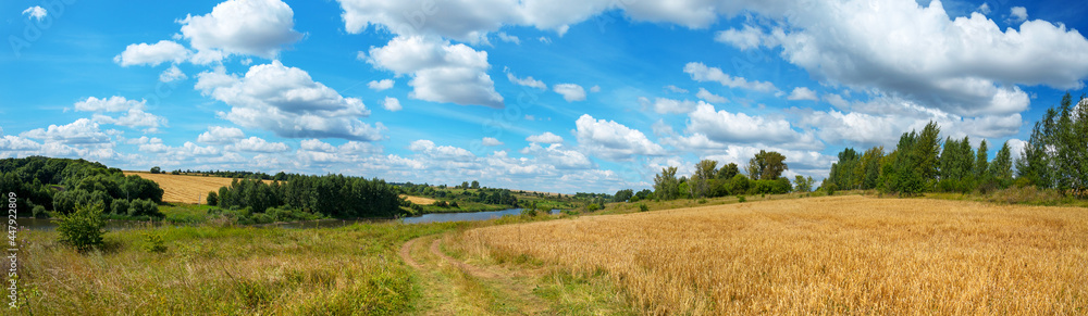 Summer landscape with river and blue sky Summer landscape with river and blue sky