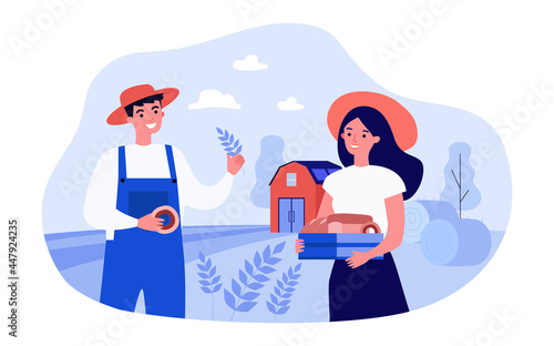 Male and female farmers with homemade bread in front of barn. Happy couple making bread in countryside flat vector illustration. Agriculture, bakery concept for banner, website design or landing page